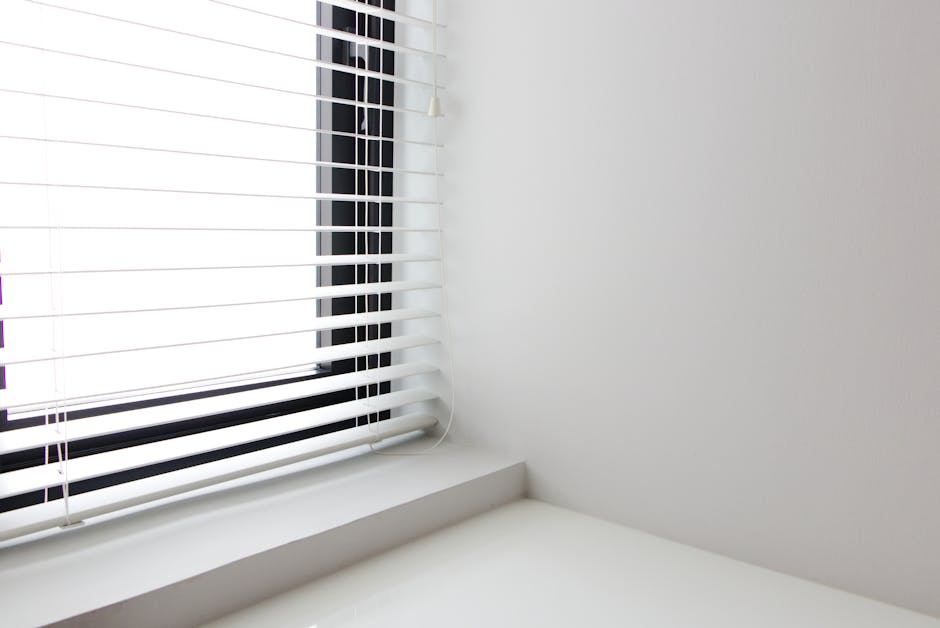 Modern living room showcasing beautifully crafted custom window blinds